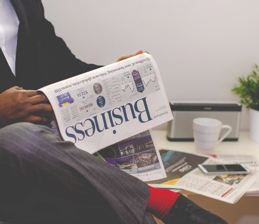 The hand rail is going a little faster than the moving sidewalk.